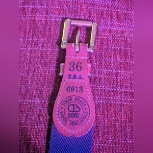 Dooney & Bourke Pink Leather Strap with Brass Buckle